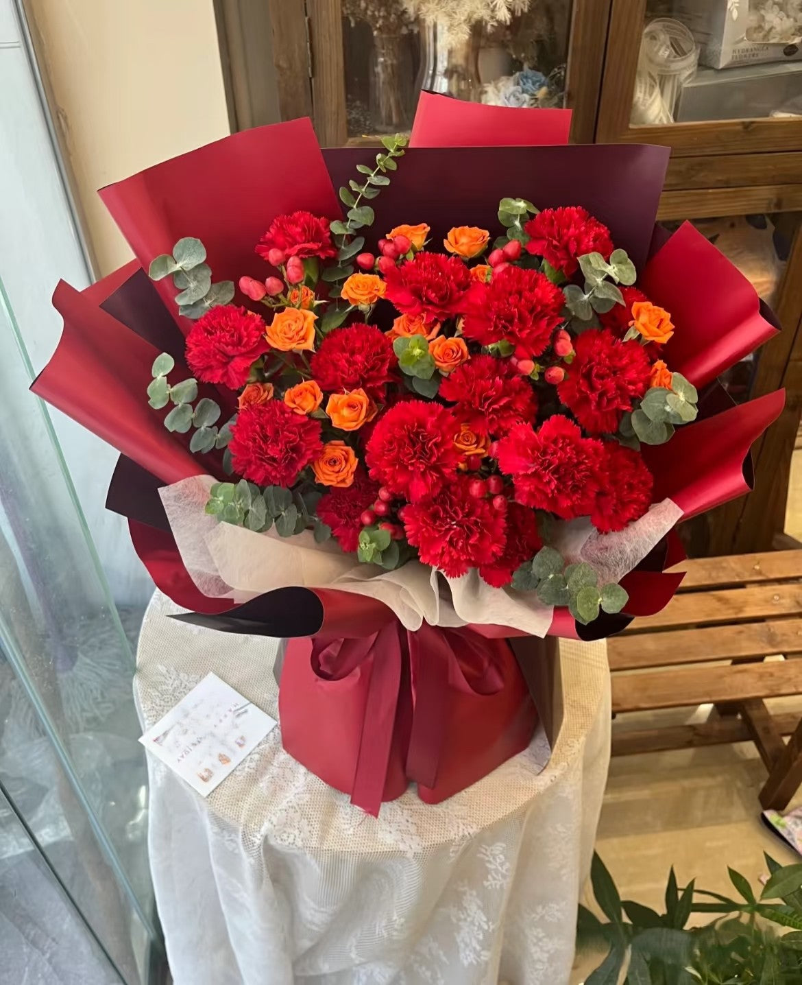 11枝紅色康乃馨橙泡泡混搭鮮花束